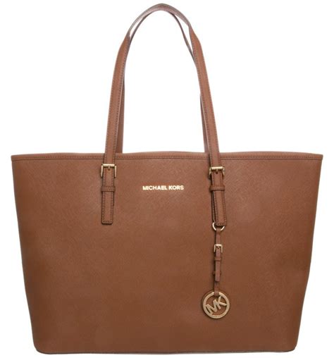 michael kors conterfeit gloabl|Michael Kors bag text.